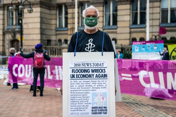 Birmingham, UK. 13 Oct, 2020. Extinction Rebellion protesters carry out action outside the Birmingham City Council highlighting the council’s inaction on the climate emergency in Birmingham, UK. Credit: Vladimir Morozov/akxmedia.